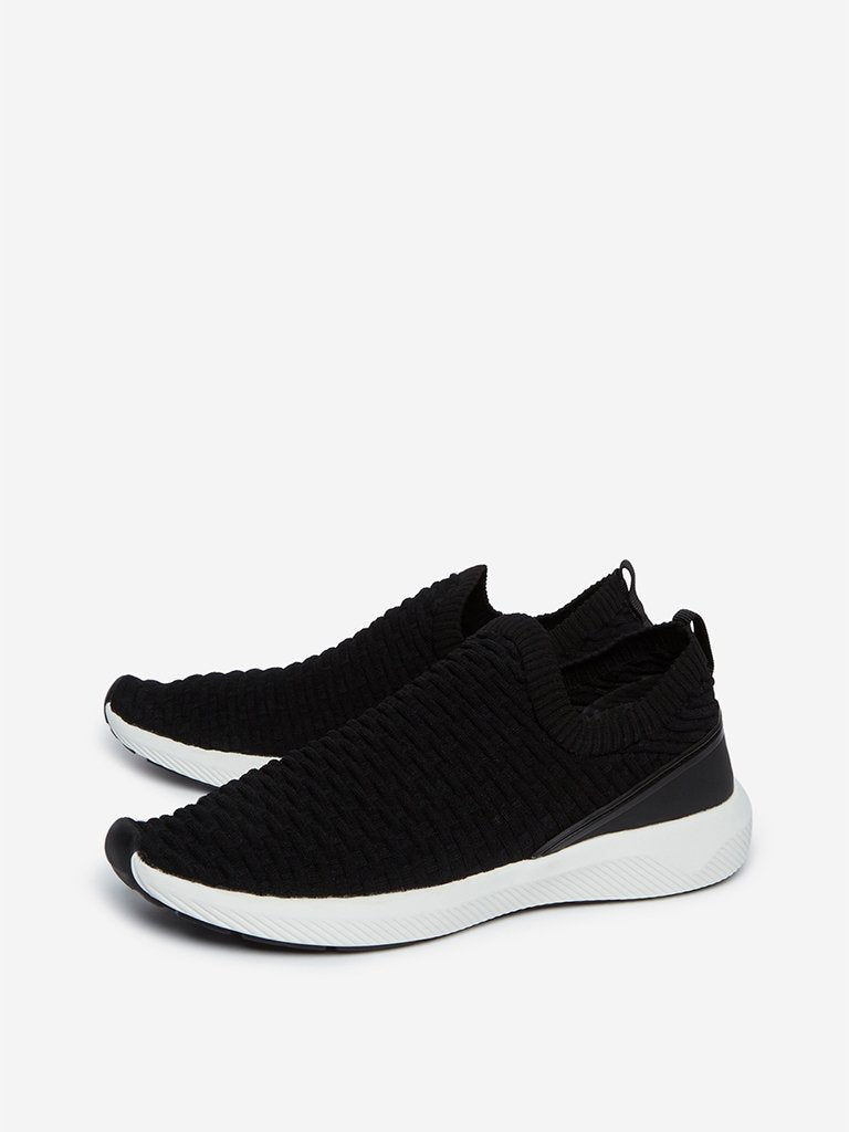 SOLEPLAY Black Weave Pattern Slip-On Sneakers