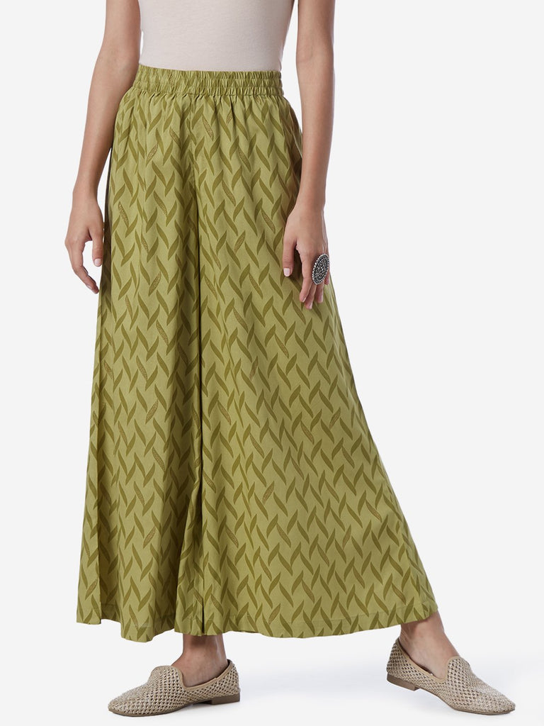 Utsa Sage Green Leaf Print Flared Palazzos