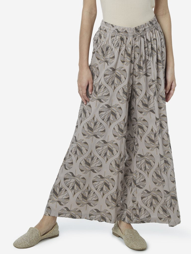 Utsa Grey Leaf Print Flared Palazzos