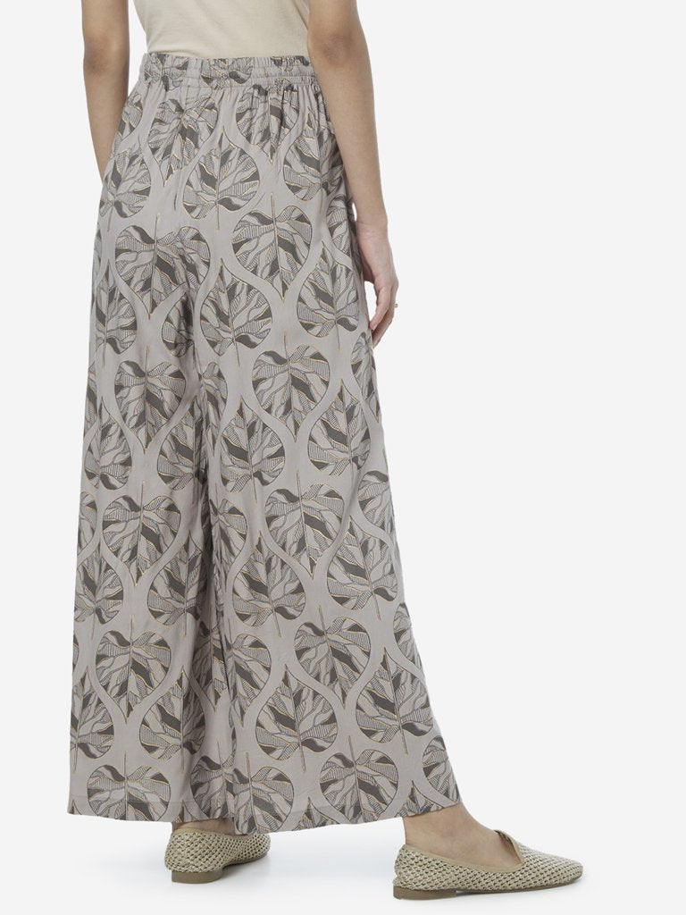 Utsa Grey Leaf Print Flared Palazzos
